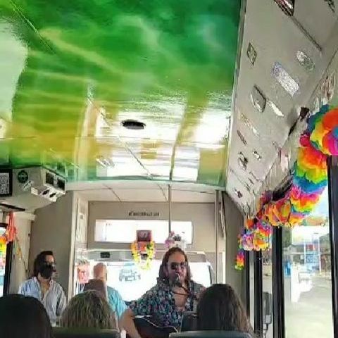 a group of people in front of a store