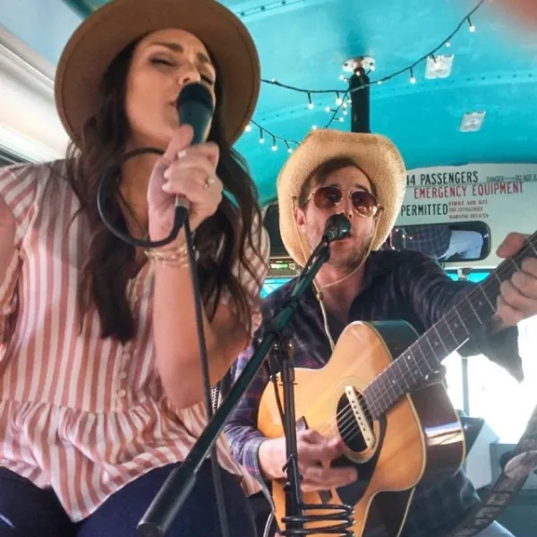 a person singing into a microphone