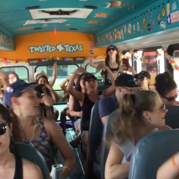 a group of people standing in front of a crowd