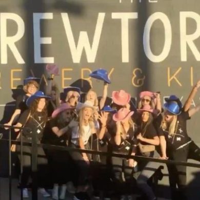 bachelorettes in silly poses in front of Brewtorium