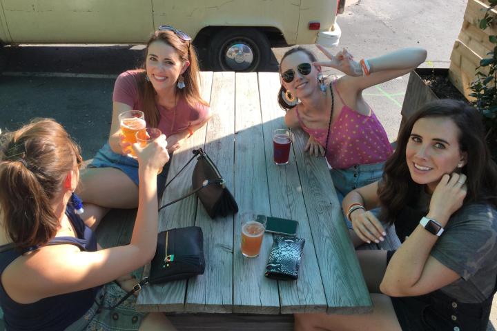 a group of people sitting at a table