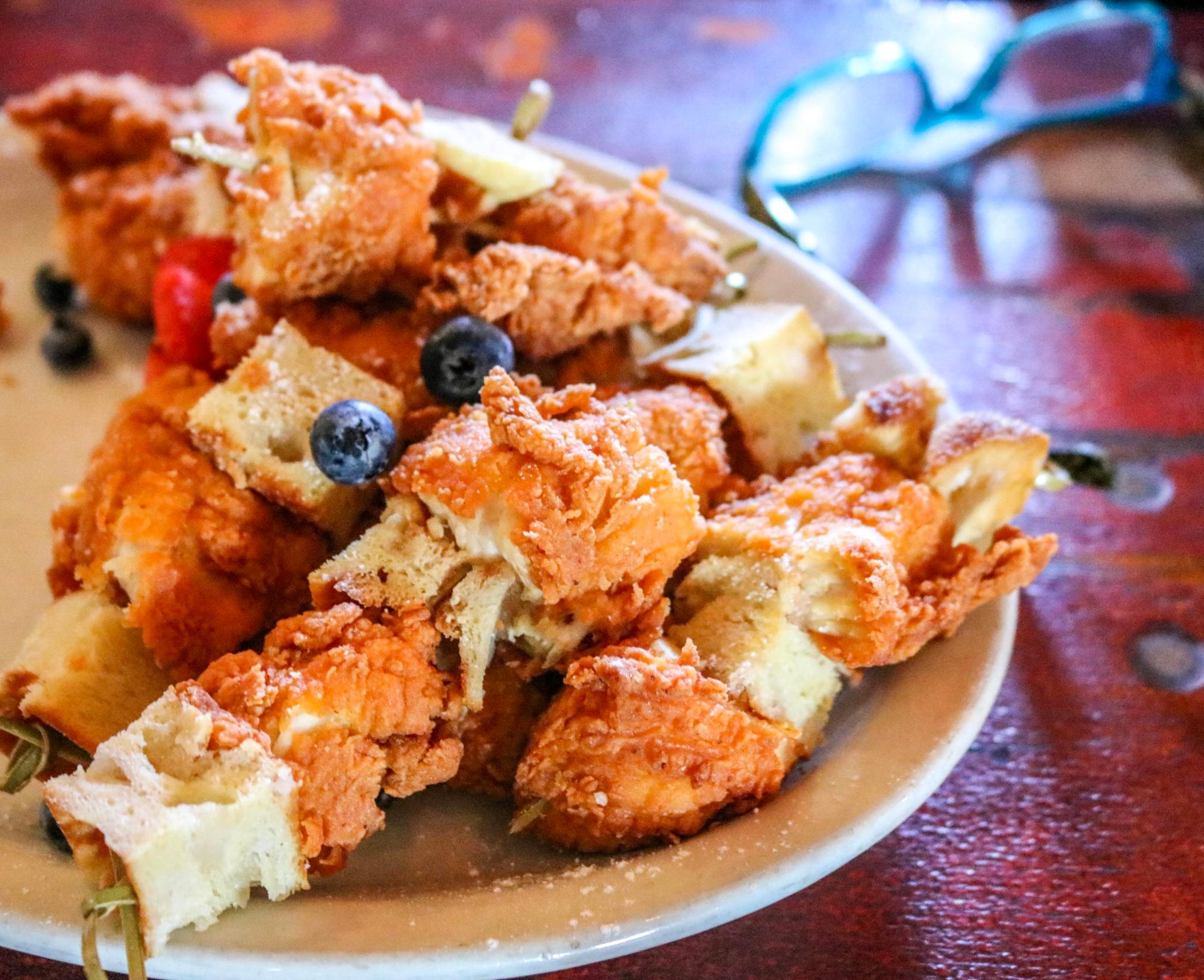 Chicken and Waffle Skewers a close up of a plate of food