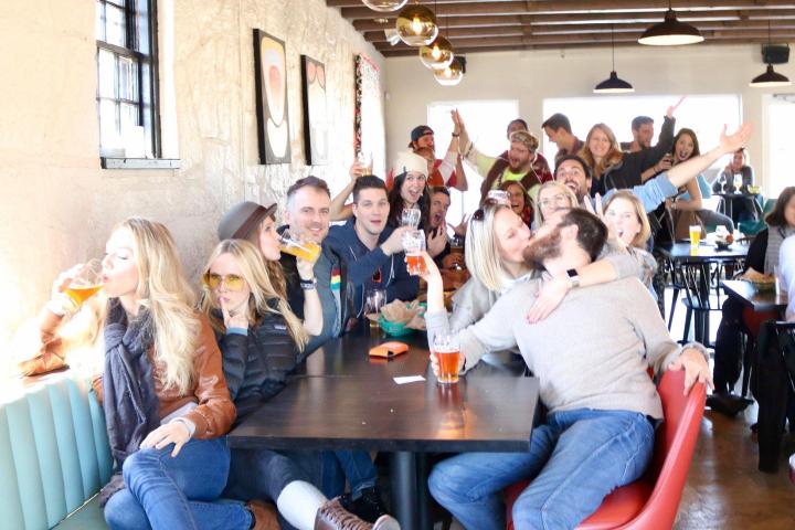 a group of people sitting at a table